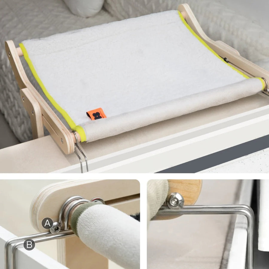 Cat hammock for bed with a wooden frame, soft fabric sling, and metal support hooks shown in close-up