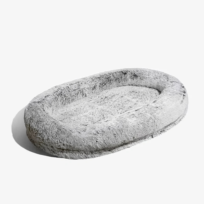 Giant dog bed for human in grey on a white background